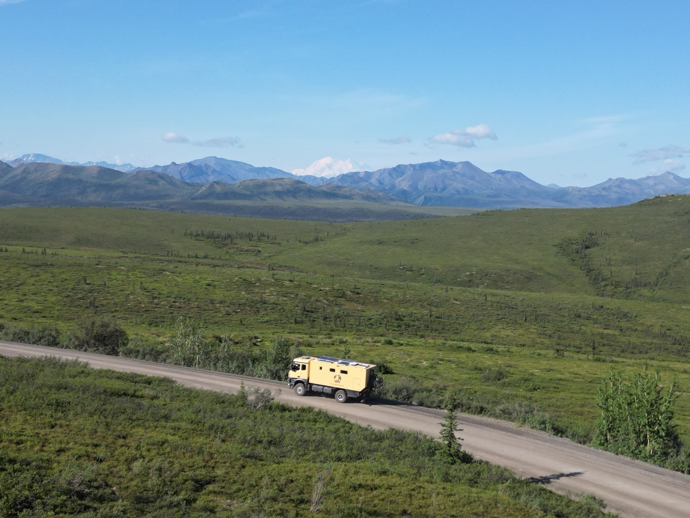 Drone view of Coco crossing the Denali Highway in Alaska